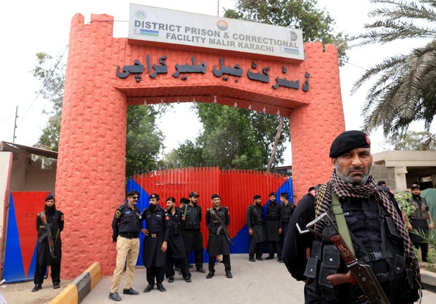 Paramilitary soldiers stand outside the Maril Regional Prison after dozens of prisoners escape from prison in Karachi 