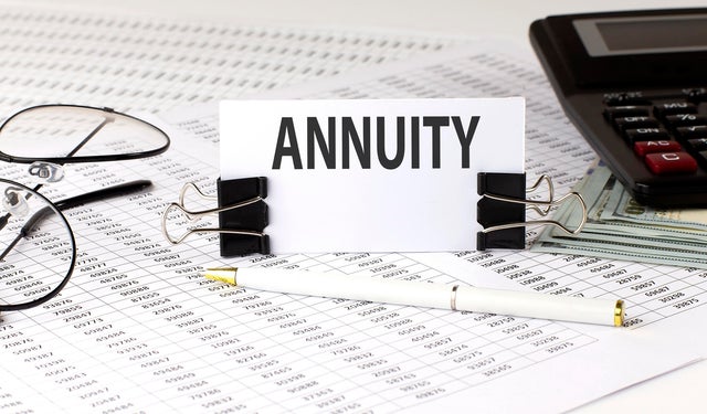 Word writing text Annuity on white sticker on chart background. Business concept 