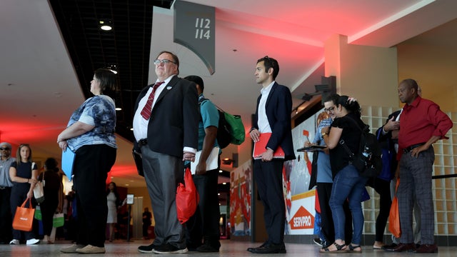 Job Seekers Look For Employment Opportunities At Job Fair In Sunrise, Florida 