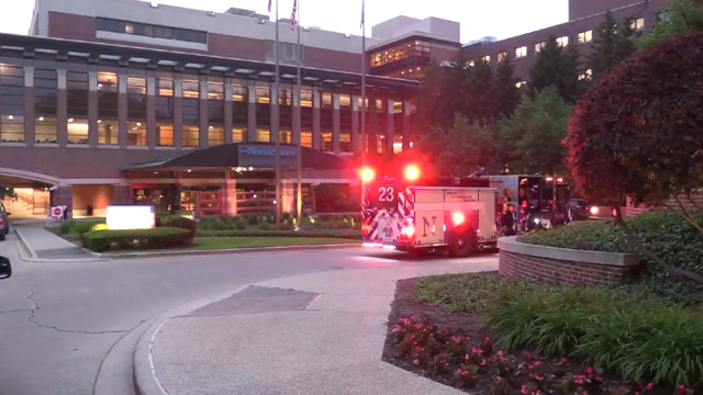 Emergency vehicles outside Endeavor Health Evanston Hospital following a shooting in the emergency department 