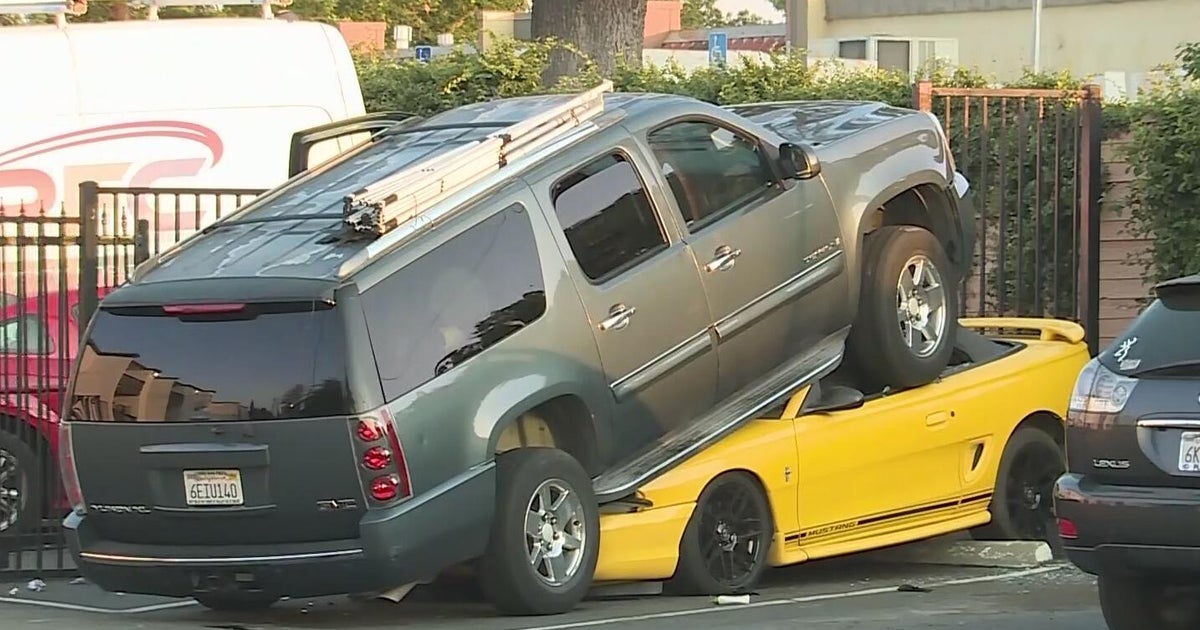 Mustang run over by SUV in Carmichael apartment complex parking lot crash 