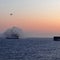 Salvage crew headed to site of cargo ship fire off Alaska coast