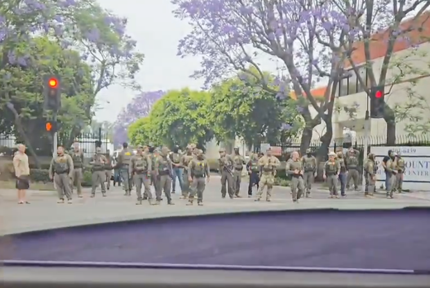 Still taken from a video posted to social media on Saturday morning shows federal law enforcement officers in Paramount.
