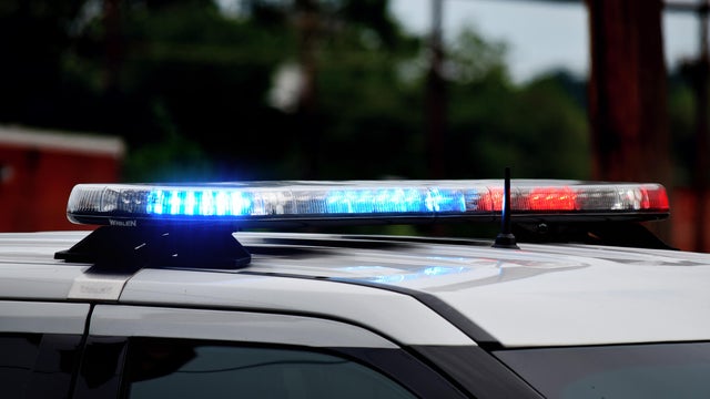 Close up police car flashing lights, generic stock photo 