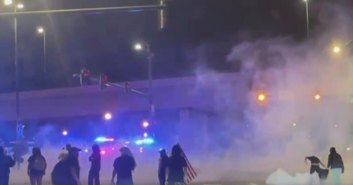 Police confront Denver marchers upset with ICE in chaotic exchanges ...