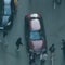 Car speeds through ICE protest crowds in Chicago
