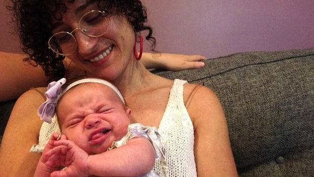 Doula Elizabeth Weinstein with the youngest child of Montgomery County couple Mary and Marissa 