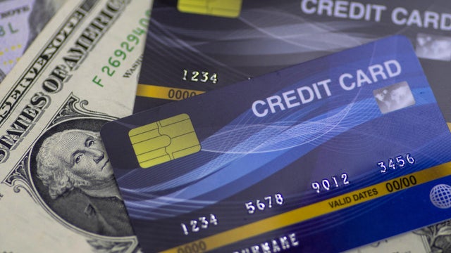 Credit Card on dollar bills as wealthy concept 