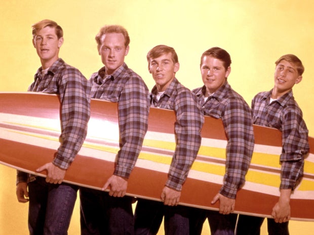 Beach Boys With A Surfboard