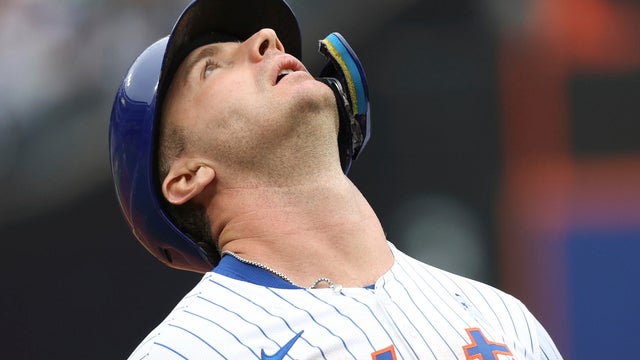 New York Mets' Pete Alonso reacts after Tampa Bay Rays second baseman Brandon Lowe threw the ball to first baseman Jonathan Aranda to put him out during the sixth inning of a baseball game Sunday, June 15, 2025, in New York. 