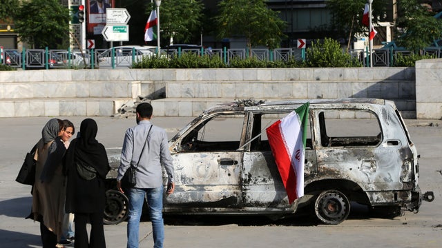 Iranian Red Crescent ambulance hit in Israeli strike displayed in Tehran 