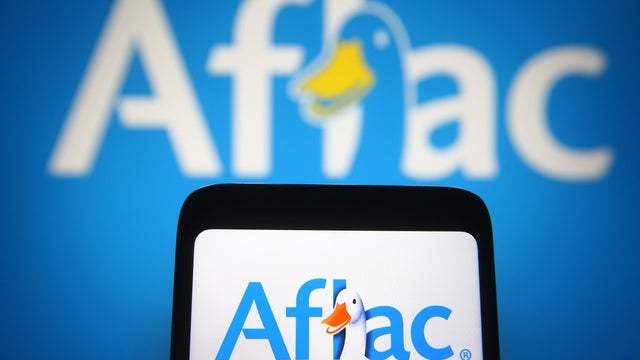 In this photo illustration the Aflac logo of an US insurance 
