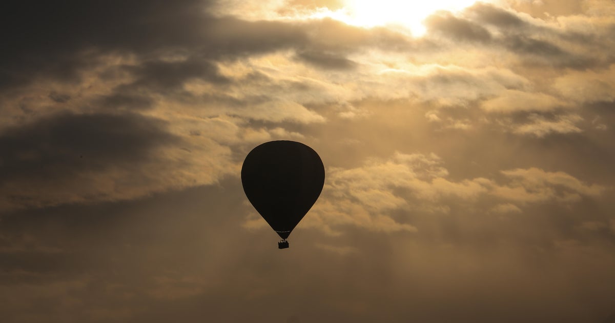 Hot air balloon catches fire and falls, killing at least 8 people
