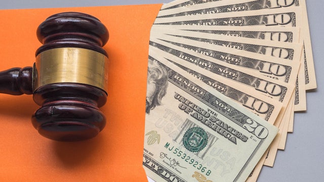money legal Financial business concept wooden gavel with usa dollar close up 