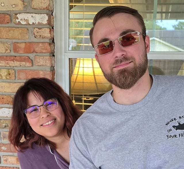 Adrian Clouatre takes a selfie of himself and his wife Paola on May 26, 2024, in Baton Rouge, Louisiana. 