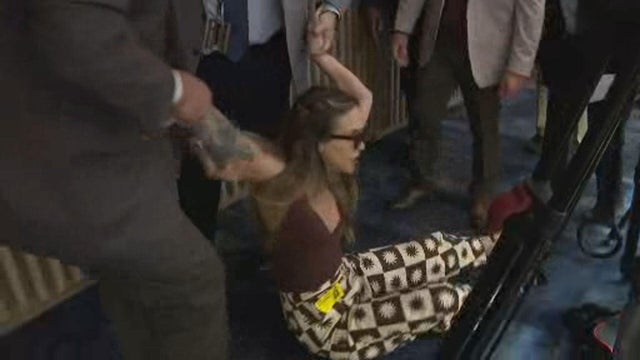 woman-dragged-dade-commission-6-26-2025.jpg 
