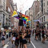 New Yorkers celebrate during the annual Pride March into the West Village on June 30, 2024 in New York City. 