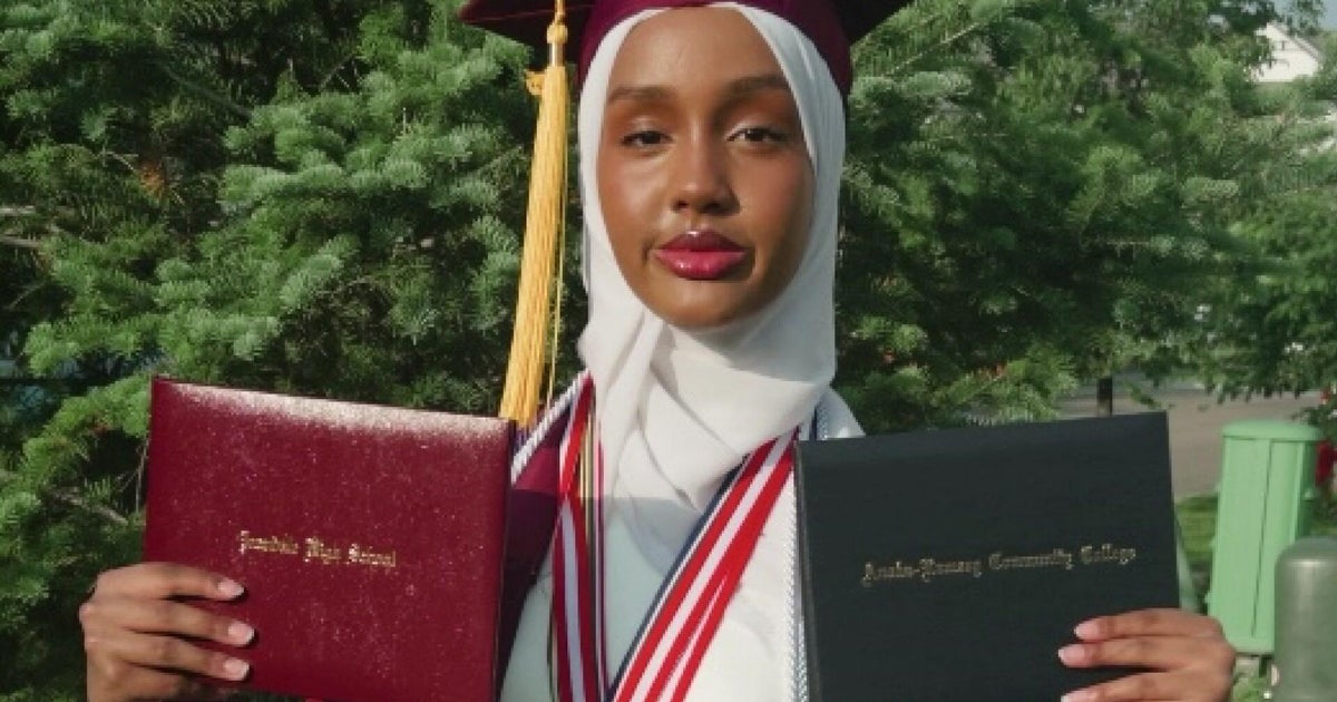 First-generation student graduates college and HS simultaneously 