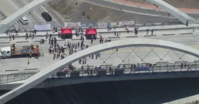 Sixth Street Bridge near downtown Los Angeles blocked by apparent ICE protesters 