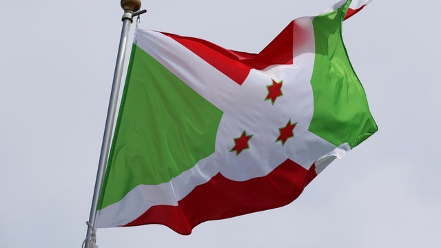 The national flag of the Republic of Burundi, fluttering in 