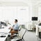 Hiring surged in June, shrugging off economic worries