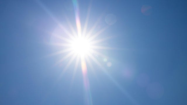 Full bright sun with blue sky 