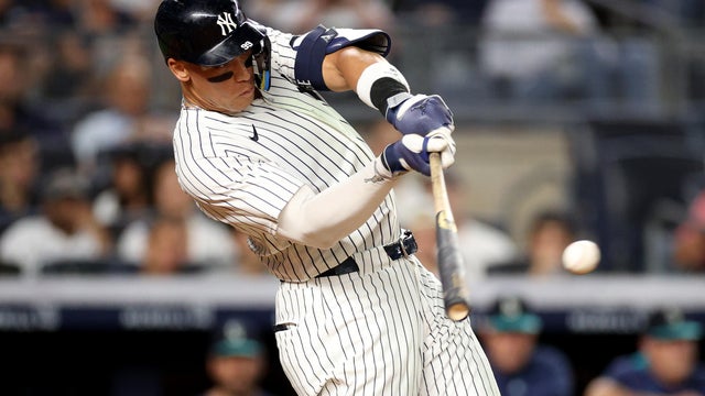 Aaron Judge #99 of the New York Yankees connects for a single in the sixth inning against the Seattle Mariners at Yankee Stadium on July 08, 2025 in New York City. 