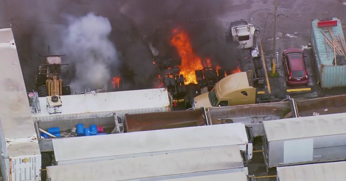 Semi-trucks catch fire at McCook facility and lot 