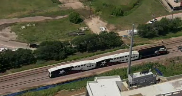 Two dead after vehicle collides with train in Dallas, officials say 
