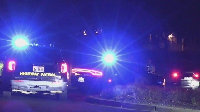 Generic police lights and yellow police tape at crime scene 
