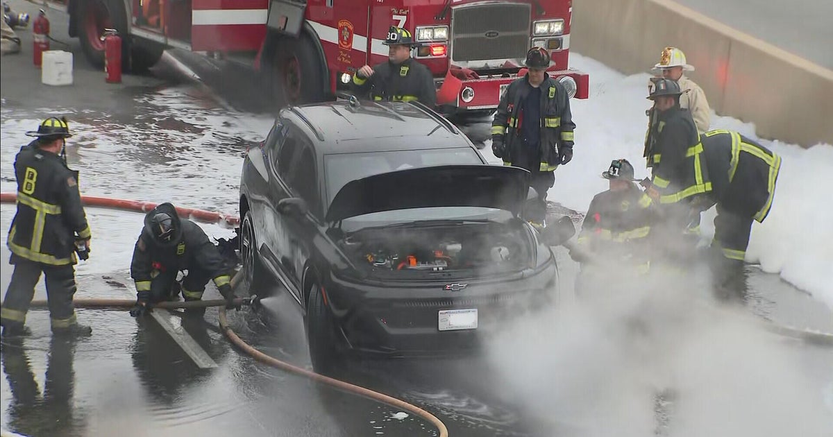 Mass Pike westbound shut down in Boston because of electric car fire 