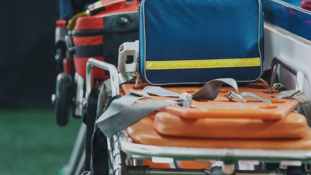 Hospital Gurney And First Aid Kit Ready For Helping 