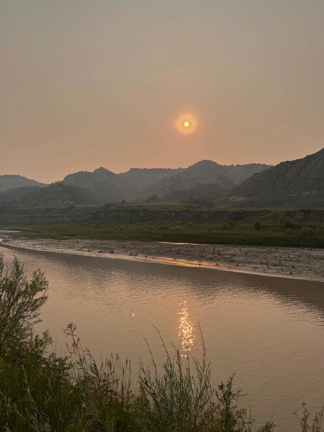 This photo taken by Joel Crane shows smoky skies July 11, 2025, near Medora, North Dakota. 