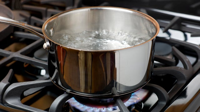 Water Boiling on a Gas Stove, stainless pot. 