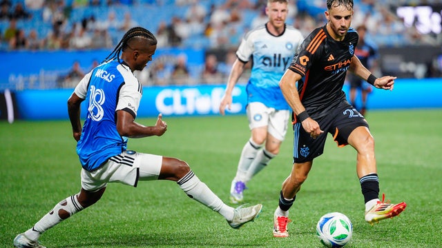 Kevin O'Toole #22 of New York City FC passes the ball past Kerwin Vargas #18 of Charlotte FC in the second half during their game at Bank of America Stadium on July 12, 2025 in Charlotte, North Carolina. 