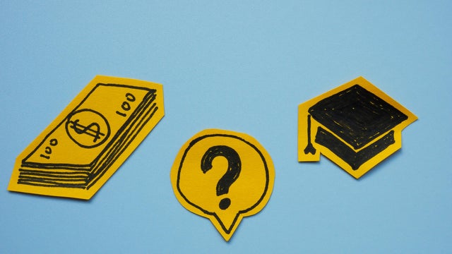 Student loans and financial decisions. Graduation cap, dollar bills, and a question mark. 
