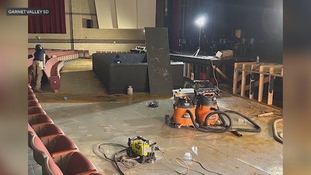 A photo from the school district shows damage and equipment in the auditorium at Garnet Valley High School 
