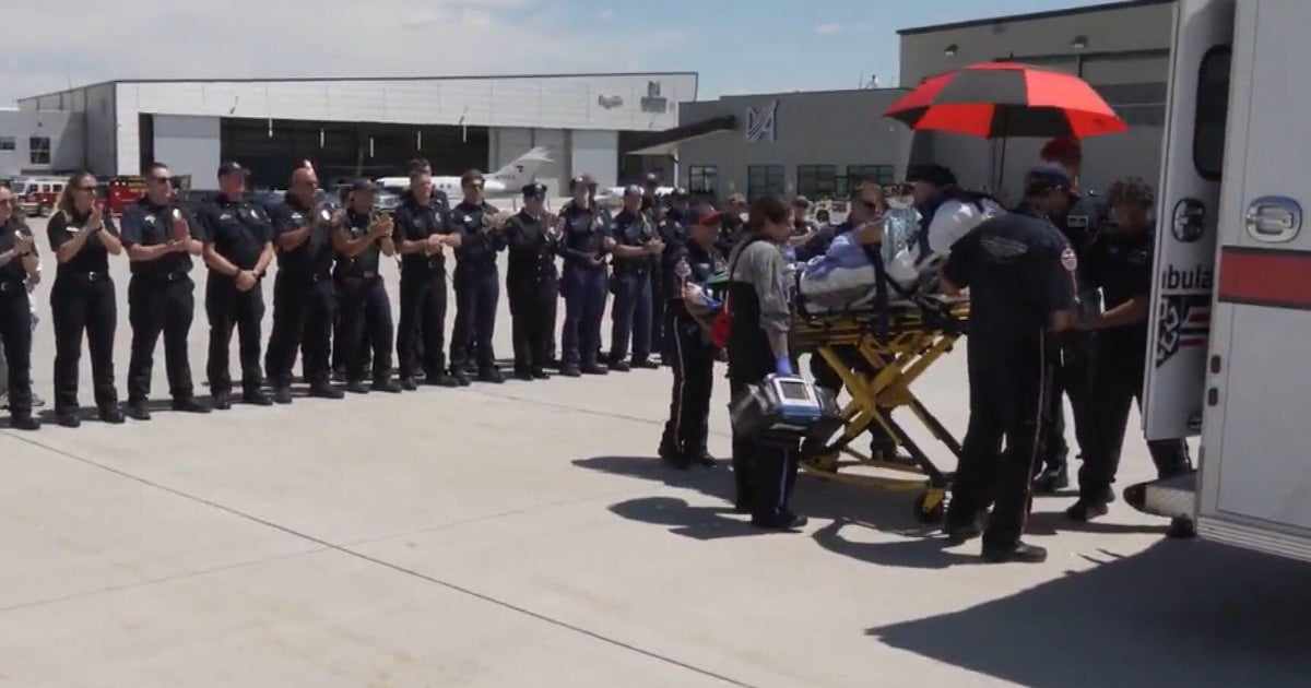 Firefighter hurt in Idaho ambush taken to Colorado for medical treatment, is greeted with applause