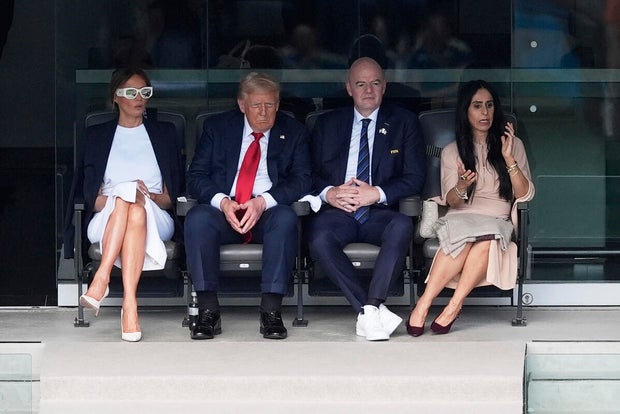 First lady Melania Trump, President Donald Trump, FIFA President Gianni Infantino and his wife Leena Al Ashqar watch the second half of the Club World Cup final in East Rutherford, New Jersey, on Sunday, July 13, 2025. 