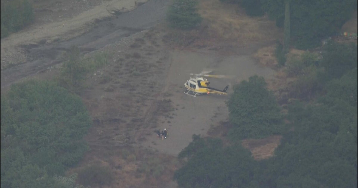 Firefighters rescue 5 people swept away by flash flood near Azusa 