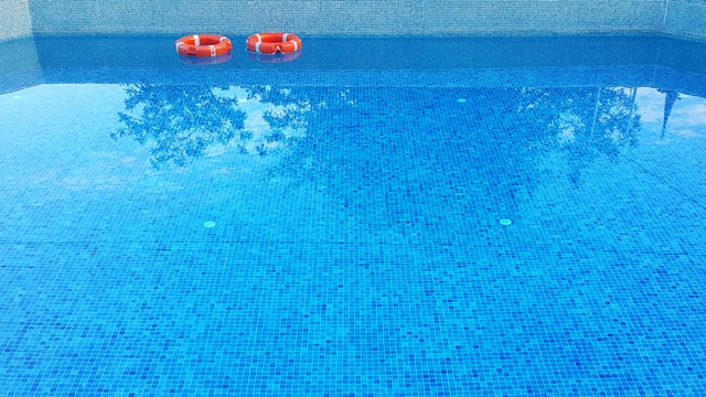 Underwater photo in a pool, looking up 