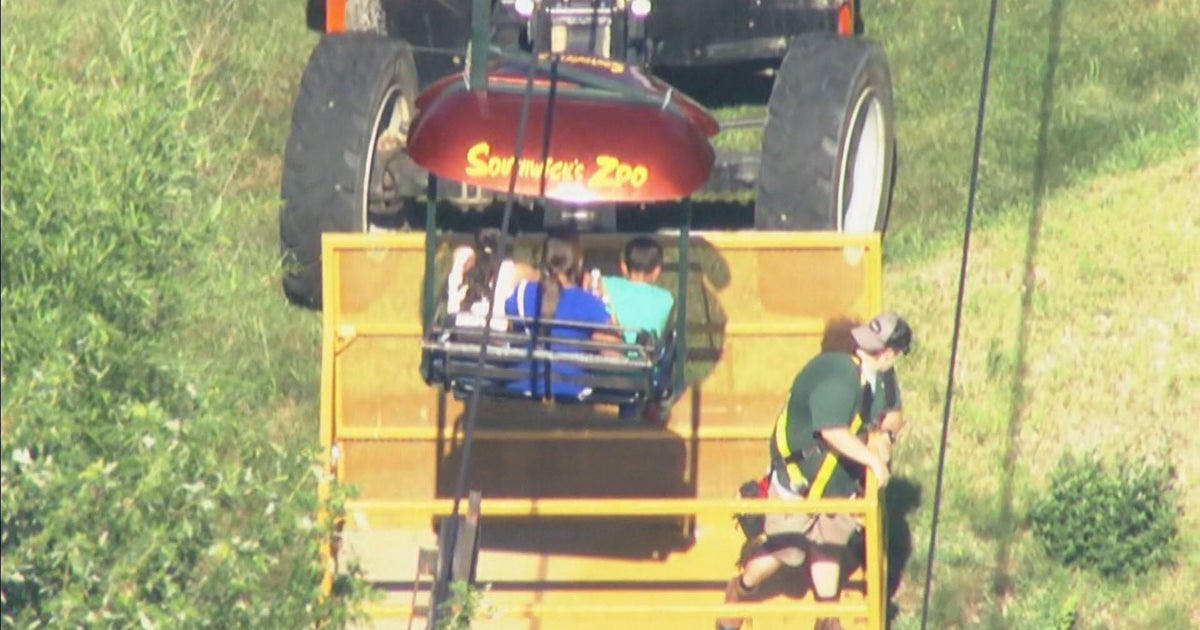 Zoo visitors stuck in the air after "Sky Ride" malfunctions 