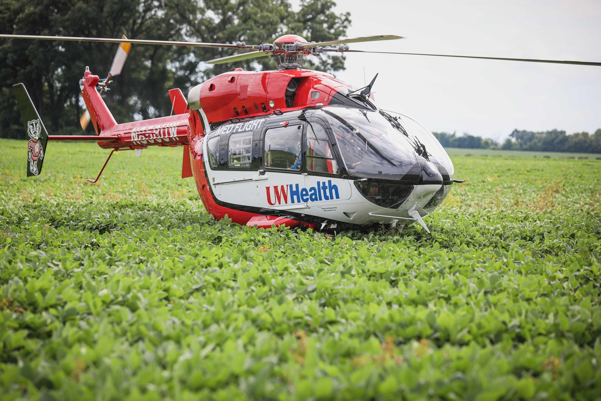 Man rushed to hospital after being trapped under tractor in water ...