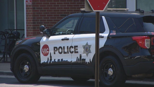 Generic police lights and yellow police tape at crime scene 