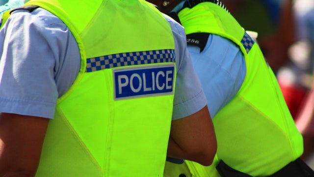 Police are seen in Hamilton, Bermuda. 