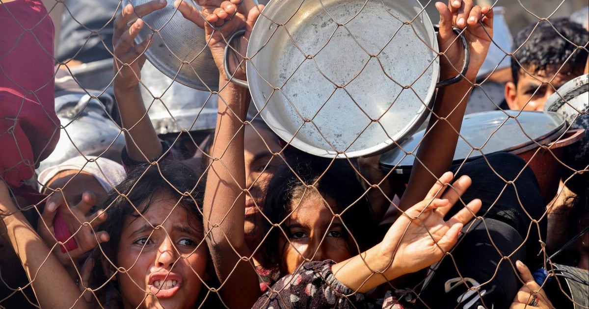 More than 100 aid groups warn of starvation in Gaza - CBS News