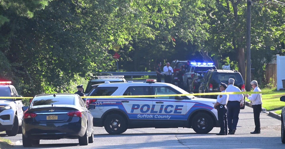 Officer shot while investigating body found on L.I., police say 