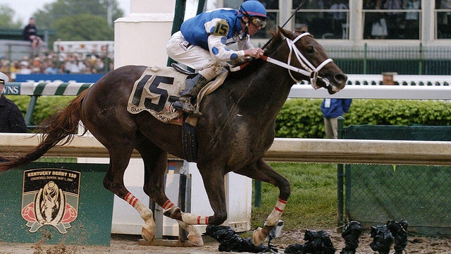 Smarty Jones and jockey Steward Elliott run in the Kentucky Derby in 2004. 