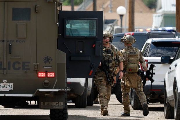 Law enforcement personnel respond to a shooting in Anaconda, Montana, Aug. 1, 2025. 