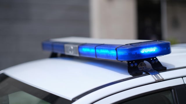 Closeup of blue lights on roof of police car 